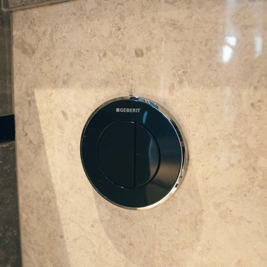 Geberit Type 10 pneumatic flush button at The Reef at King's Dock